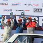 Top three finishers enjoy the Sasco Sports podium