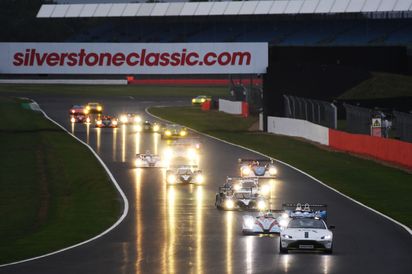 Saturday race, the field form up behind the safety car.