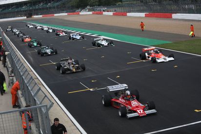 F1 grid, Mike Tilley's Ensign MN177 closest to camera